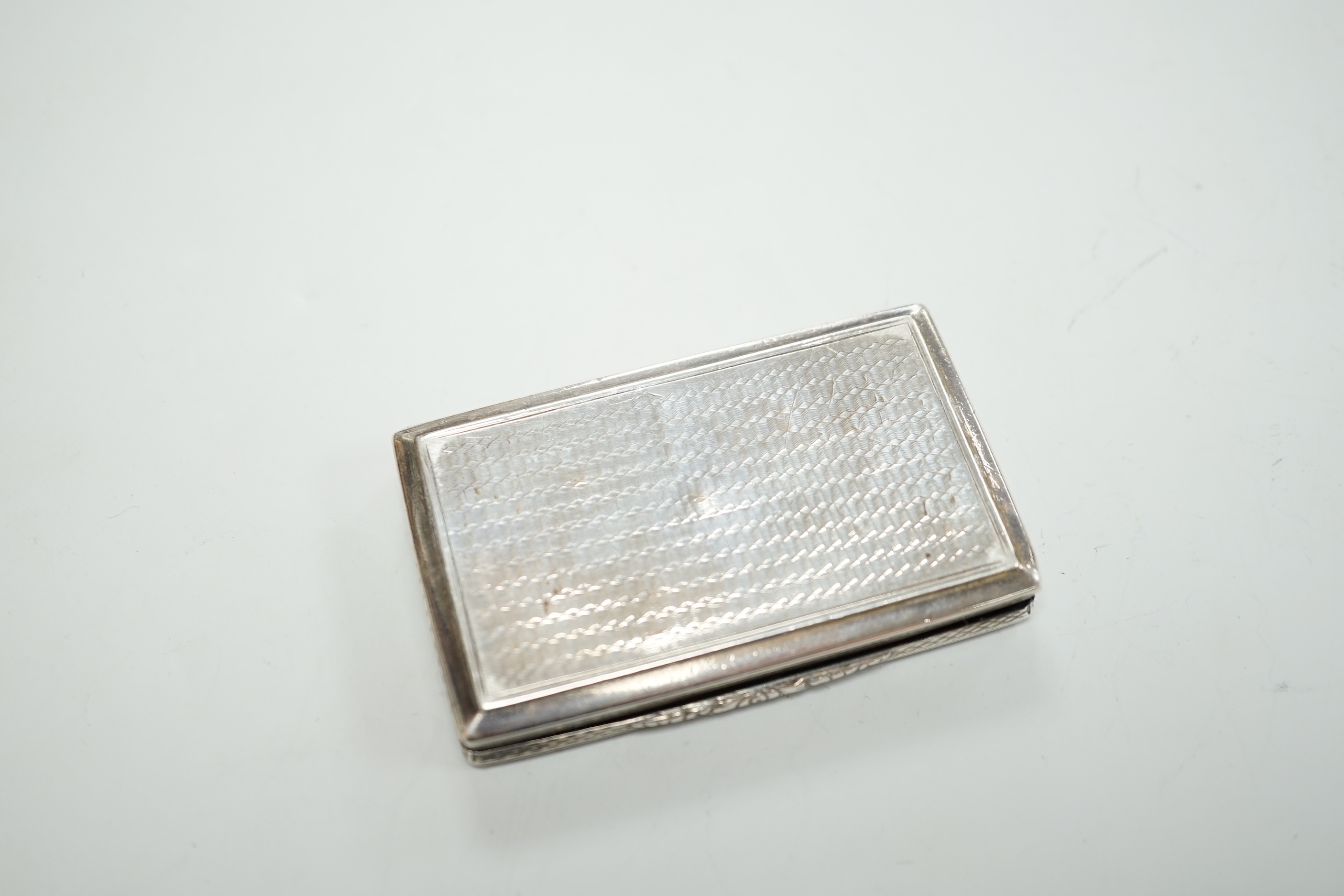 An early Victorian engine turned silver snuff box by Nathaniel Mills, Birmingham, 1840, 73mm.
